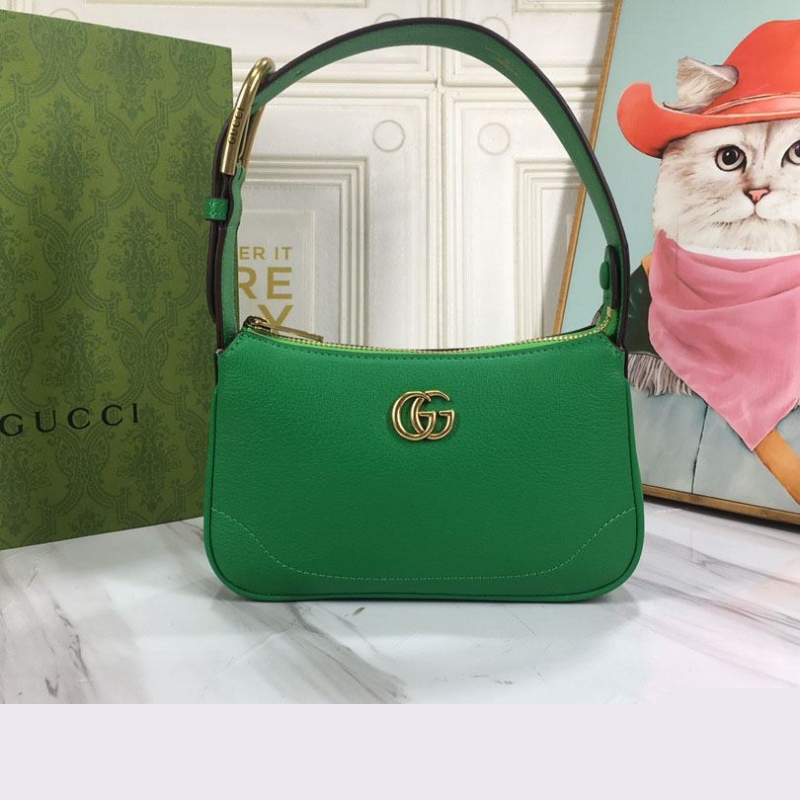 G*u*i top handle bags